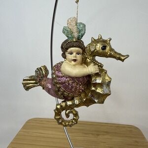 Katherine's Collection Curvy Mermaid Riding Seahorse Ornament Pink Glitter 5"